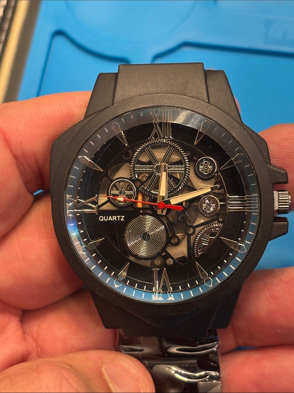 Men's Black Quartz Skeleton Dial Watch with Red Accents